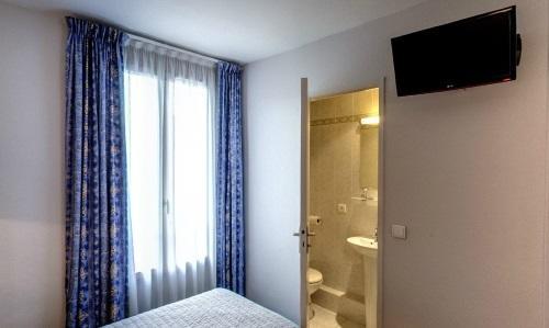 Camelia Hotel Paris Exterior photo